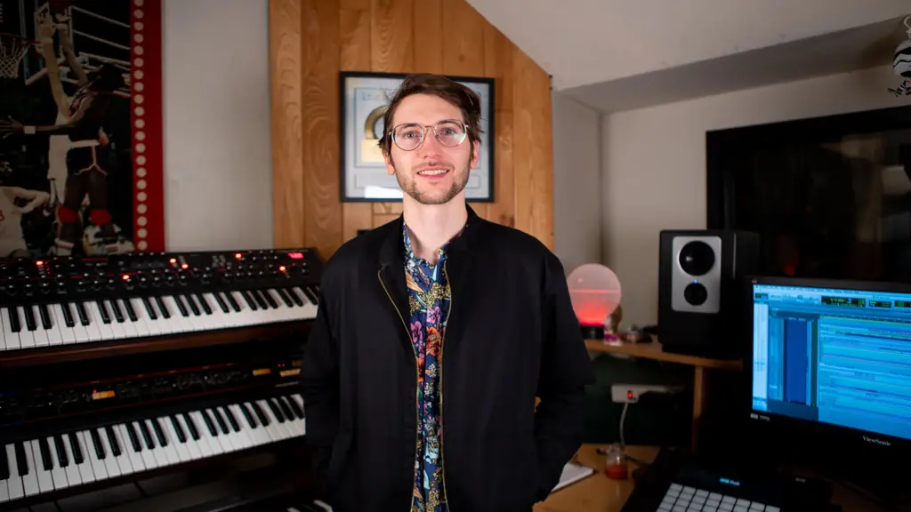 Levi+Downey+Music+Producer+In+Studio.webp